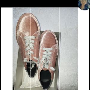 Brunello Cucinelli pink velvet sneakers.